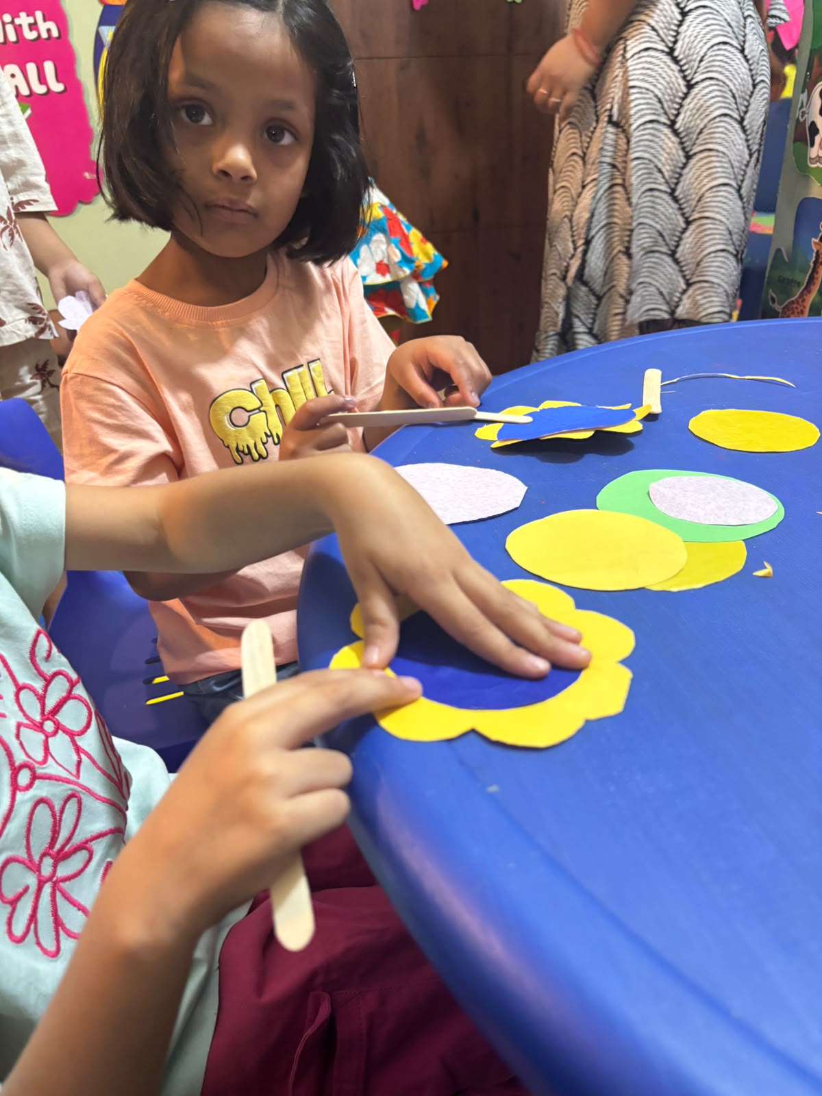 Toddlers playing with learning blocks